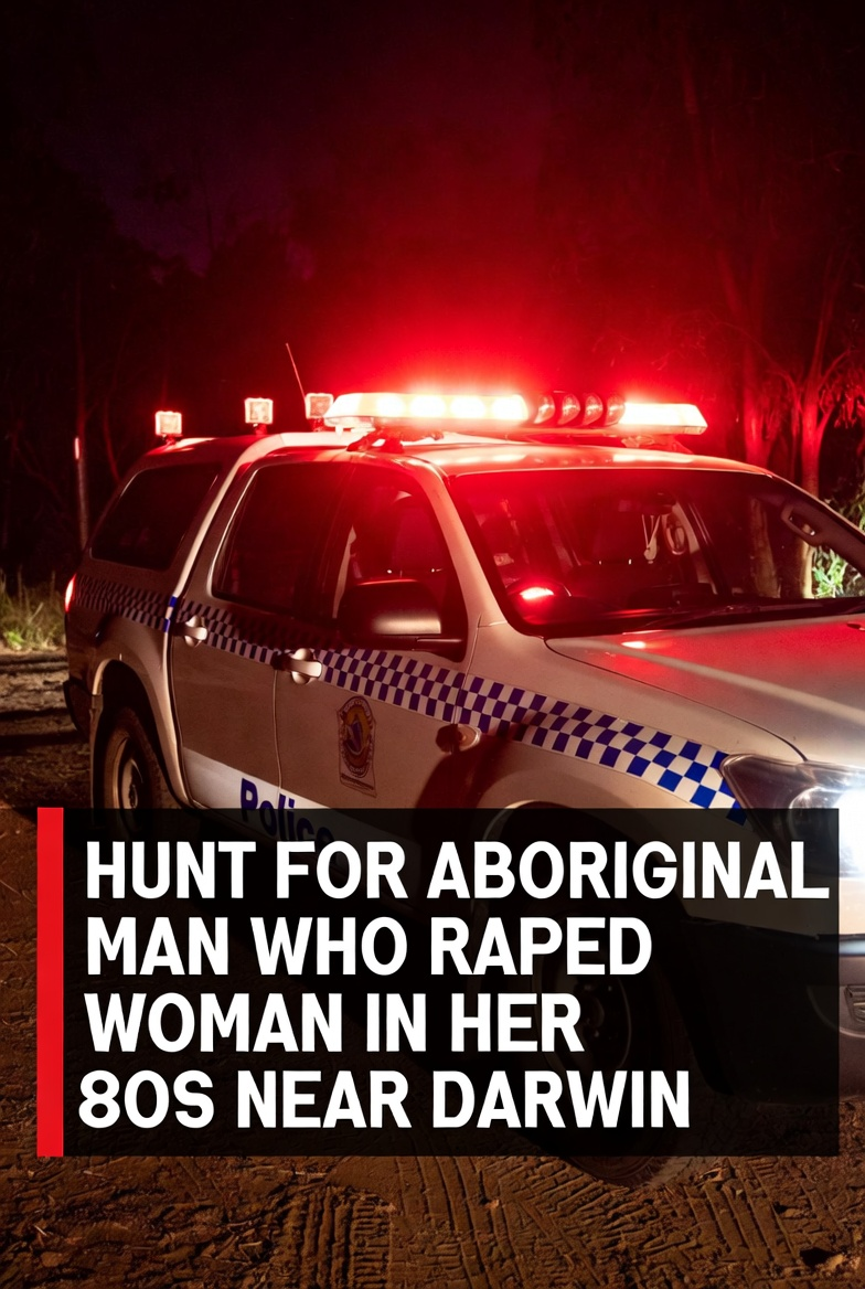 Darwin Outskirts Terror: Massive Manhunt Underway For Aboriginal Rapist After Horrific Home Invasion Assault On Elderly Woman In Her 80s! 1 Official police response vehicle flashing red warning lights on a dark territory dirt road clearing track